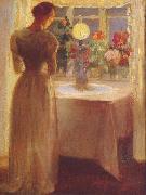 Anna Ancher Young Girl Before a Lit Lamp painting
